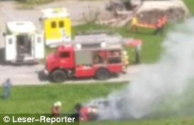 Pictures from the scene showed a car in flames alongside a road in St. Gallen before the blaze was extinguished by firefighters