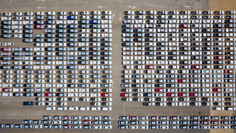 Aerial view of the parked new cars at the automotive plant royalty free stock photos