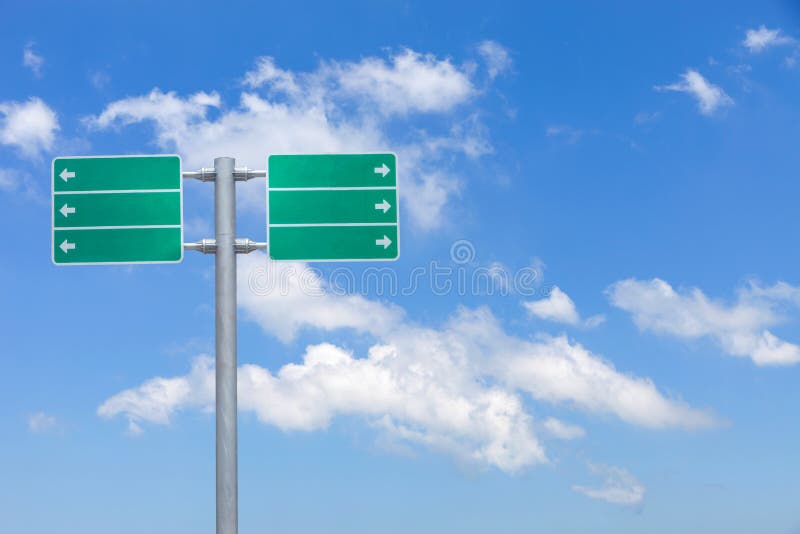 Blank green traffic road sign on sky background. royalty free stock photo