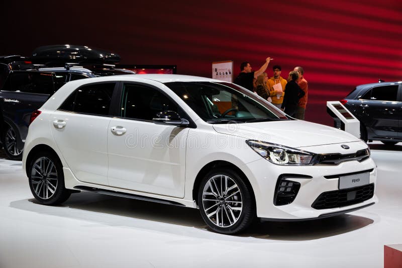 BRUSSELS - JAN 9, 2020: New Kia Rio car model showcased at the Brussels Autosalon 2020 Motor Show. White modern automobile automotive type newest autoshow stock images