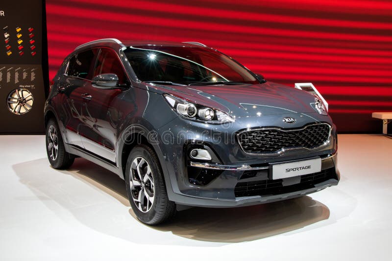 BRUSSELS - JAN 9, 2020: New 2020 Kia Sportage car model presented at the Brussels Autosalon 2020 Motor Show. Red suv 4x4 modern automobile automotive type royalty free stock photography