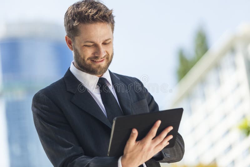 Businessman Using Tablet Computer royalty free stock image