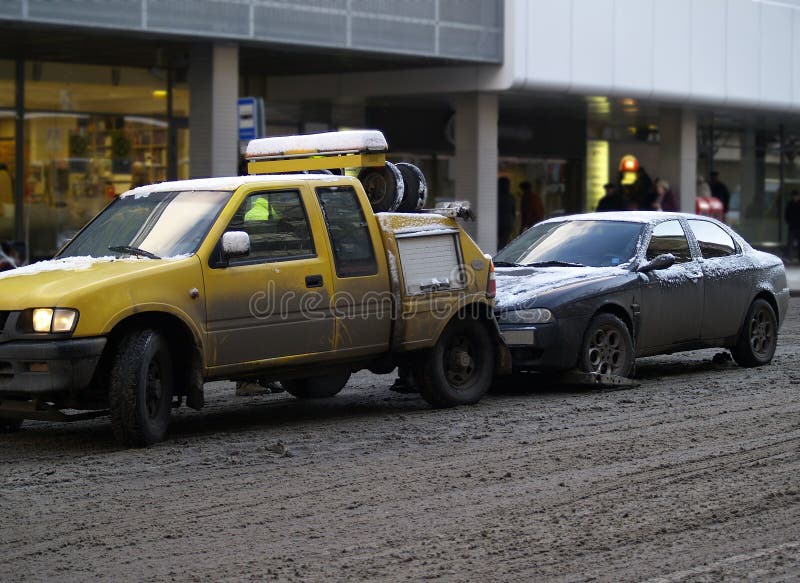 Car evacuation. For illegal parking in city center stock photography