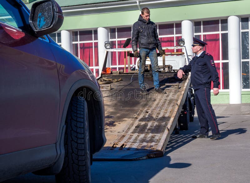 Car preparation for evacuation due to improper parking stock photo