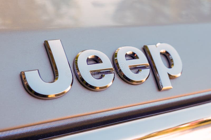 Close up of Jeep logo on the SUV auto. Jeep is a brand of American automobiles, FCA US LLC. Tallinn / Estonia - June 23, 2020: Close up of Jeep logo on the SUV royalty free stock photo