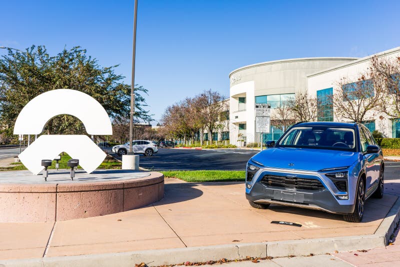 Dec 14, 2019 San Jose / CA / USA - NIO ES8 electric SUV displayed in front of NIO headquarters in Silicon Valley; NIO logo visible. On the left; NIO is a stock photos