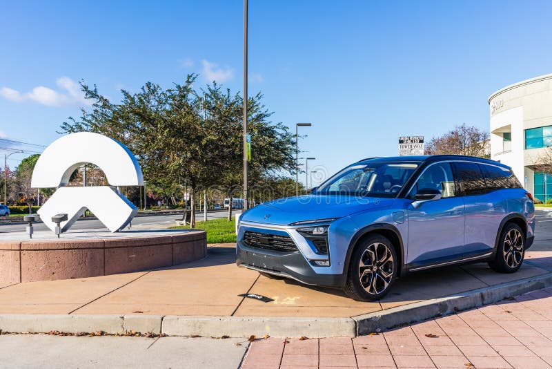 Dec 14, 2019 San Jose / CA / USA - NIO ES8 electric SUV displayed in front of NIO headquarters in Silicon Valley; NIO logo visible. On the left; NIO is a stock photos