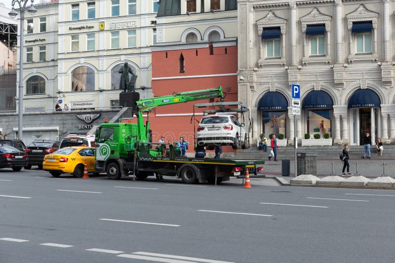 Evacuation of the car for improper parking in center Moscow stock images