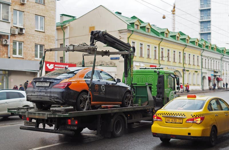 Evacuation of the violator`s car stock photos