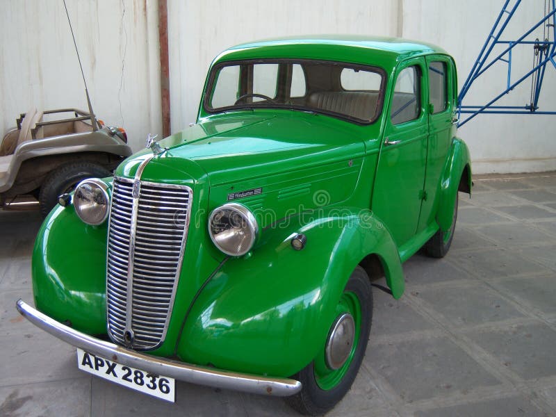 Green vintage car at Sudha Cars Museum, Hyderabad. Sudha Cars Museum is the first and only handmade Wacky Car museum in the World. It is the brainchild of Mr. K royalty free stock images
