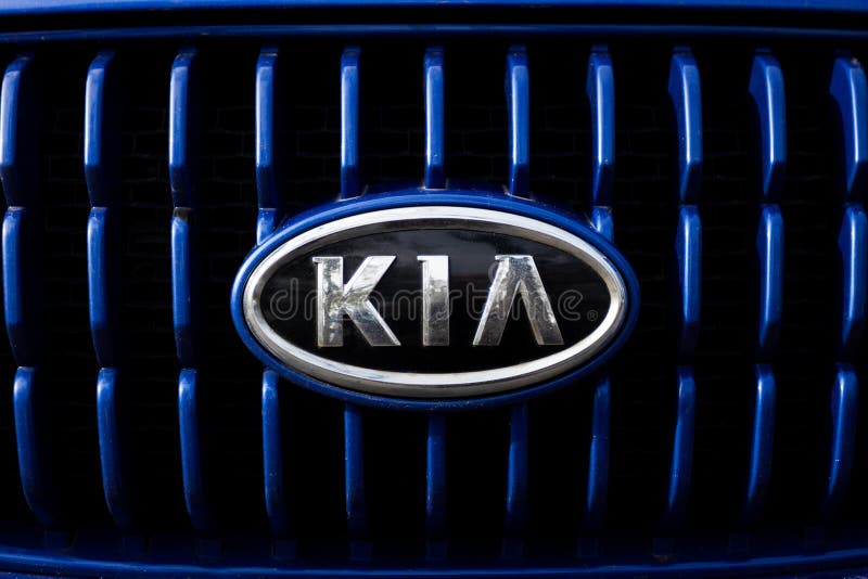 Kia motors logo and badge. ODESSA, UKRAINE - OCTOBER 16, 2016: Kia motors logo and badge on the car stock image