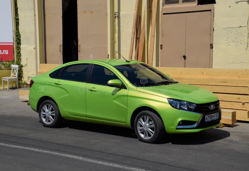 The lada vesta. Light green color. Auto parked on the roadside. stock image