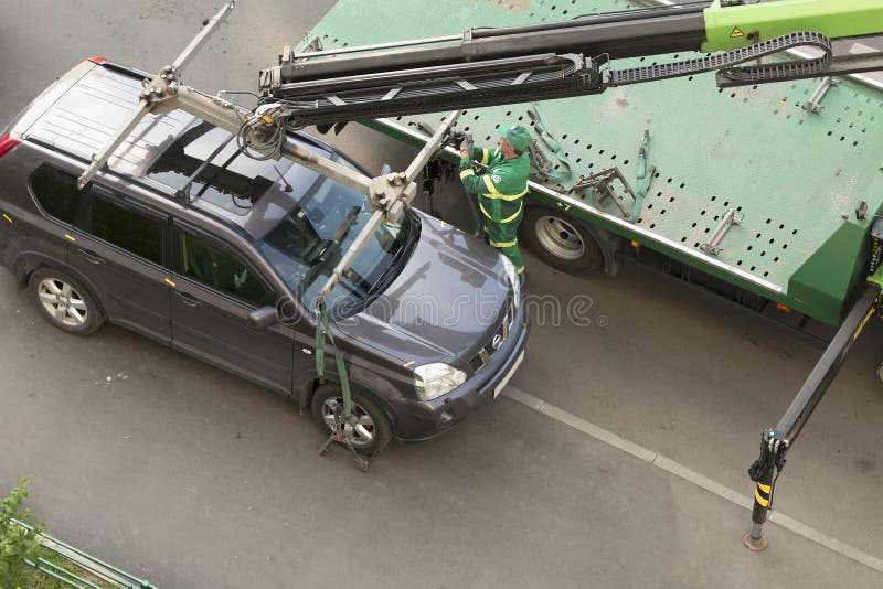 Evacuation of the car for the wrong parking on the sidewalk. Moscow / Russia - May 2019 royalty free stock photo