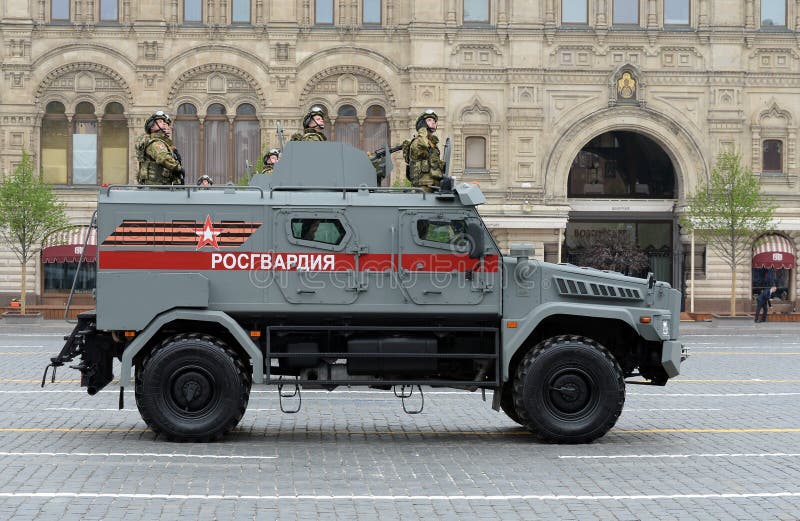 Soldiers of the national on the multi-purpose armored car `Typhoon-K` on the basis of KAMAZ - 53949. MOSCOW, RUSSIA - MAY 9, 2019: Soldiers of the national guard stock images