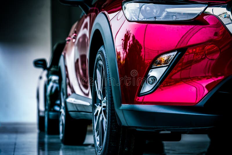 New luxury SUV compact car parked in modern showroom for sale. Car dealership office. Car retail. Shop stock images