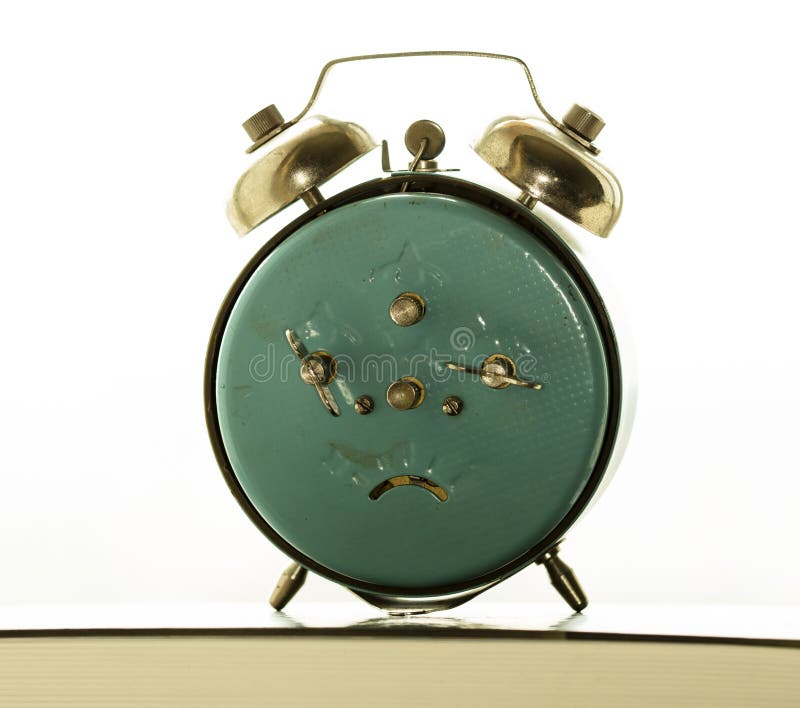 Old bracket clock, alarm clock. Old bracket clock, vintage mechanical USSR alarm clock royalty free stock photo
