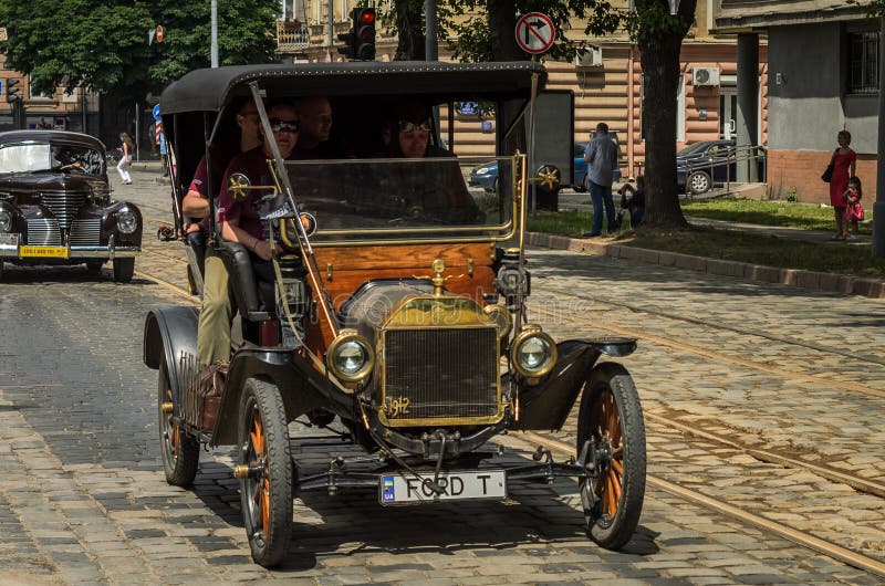 LVIV, UKRAINE - JUNE 2018: Old vintage retro car Ford T rides down the city street. Old vintage retro car Ford T rides down the city street royalty free stock photos