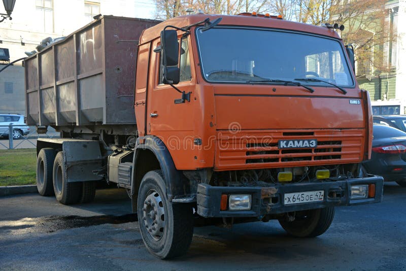 Orange truck KAMAZ. At Saint-Petersburg city on July 22, 2014 stock photography