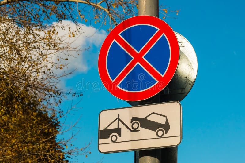 Road sign Parking prohibited and vehicle evacuation.  royalty free stock photos