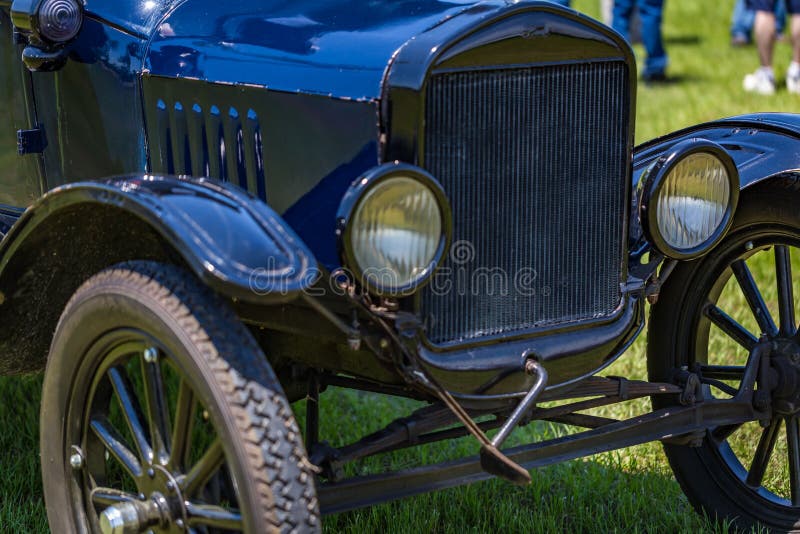 1923 Ford Model T Touring Car. Shallow depth of field closeup of the front end and engine crank handle on a 1923 Ford Model T Touring Car royalty free stock photos