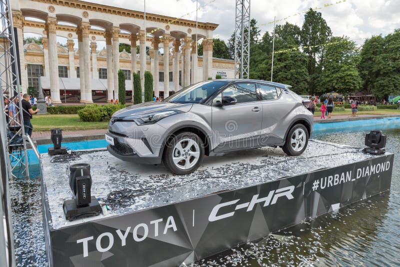 Toyota C-HR hybrid crossover in National Expocenter. Kiev, Ukraine. Promotional booth with new Toyota C-HR modern desig