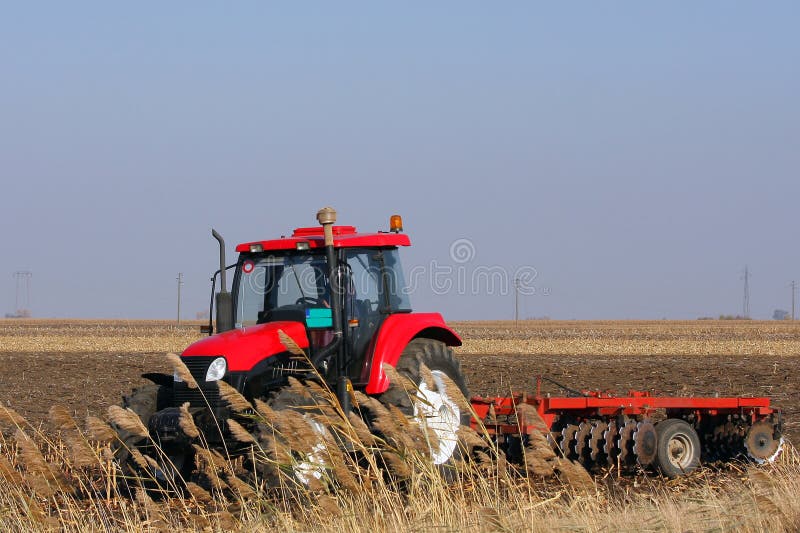 Tractor working stock photo