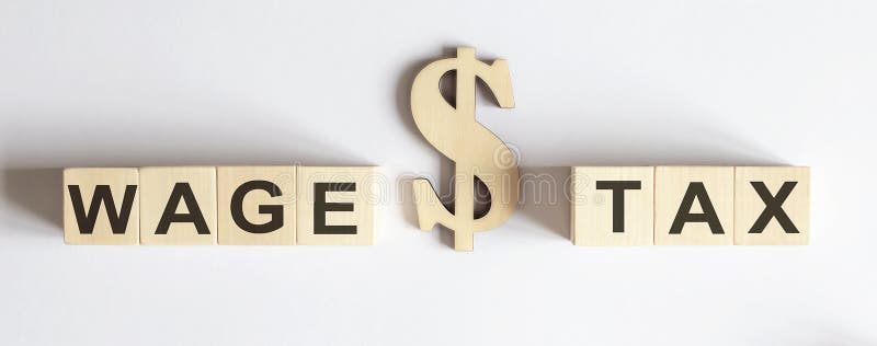 Wooden blocks with the word WAGE or TAX . Make the right decision. Real estate concept. Rent apartment. Property. Wooden blocks with the word WAGE or TAX . Make royalty free stock photo