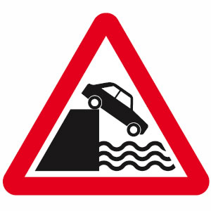 Quayside or river bank road sign