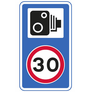 Speed camera on 30mph road sign